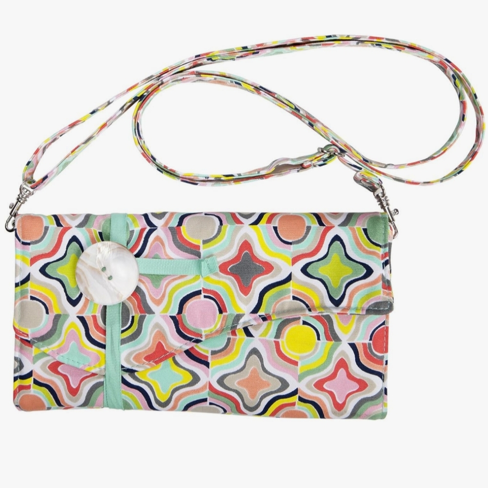 Iota Chic fabric wallet with an adjustable shoulder strap